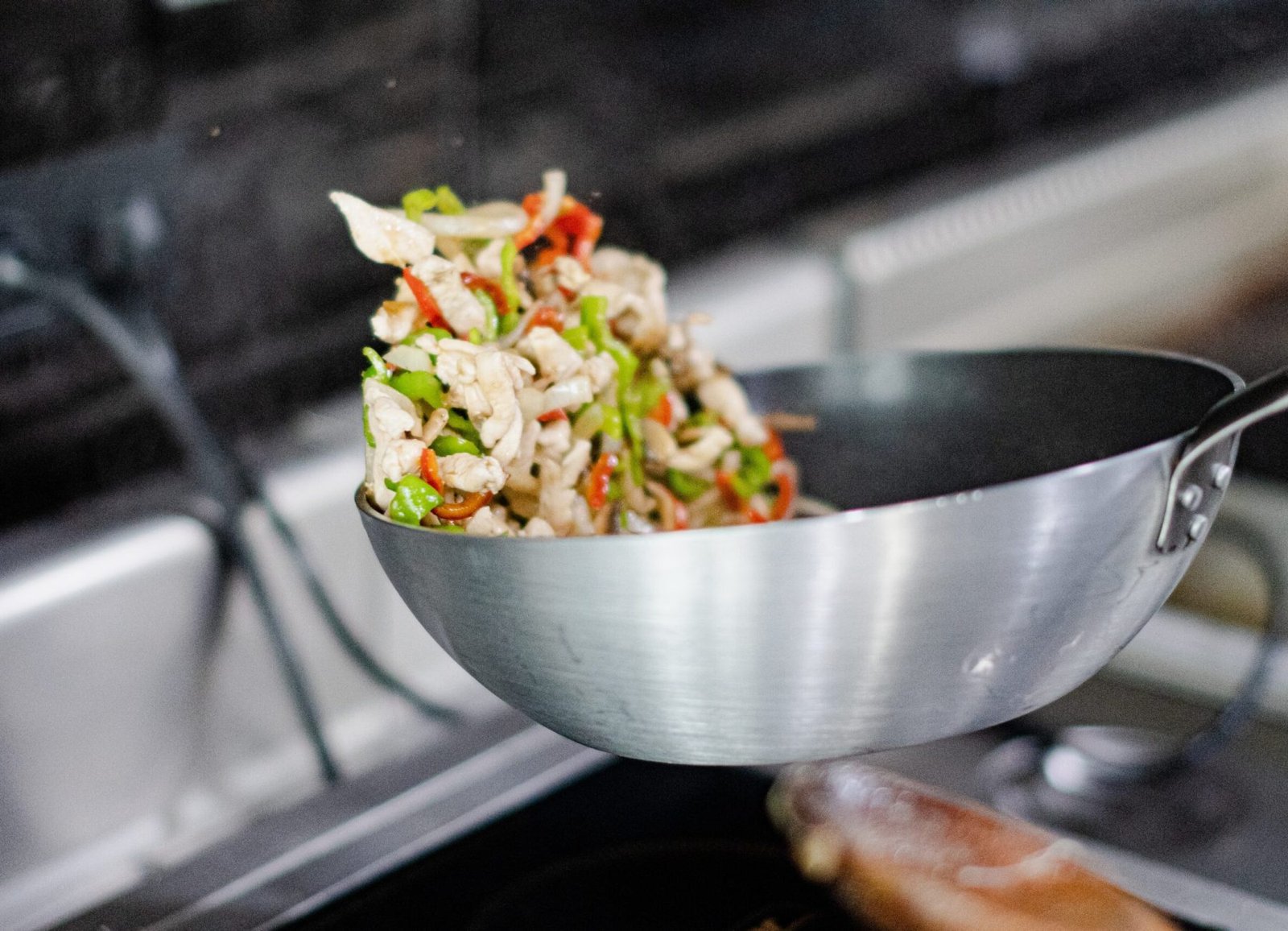 The process of frying the ingredients of Mexican quesadilla wrap